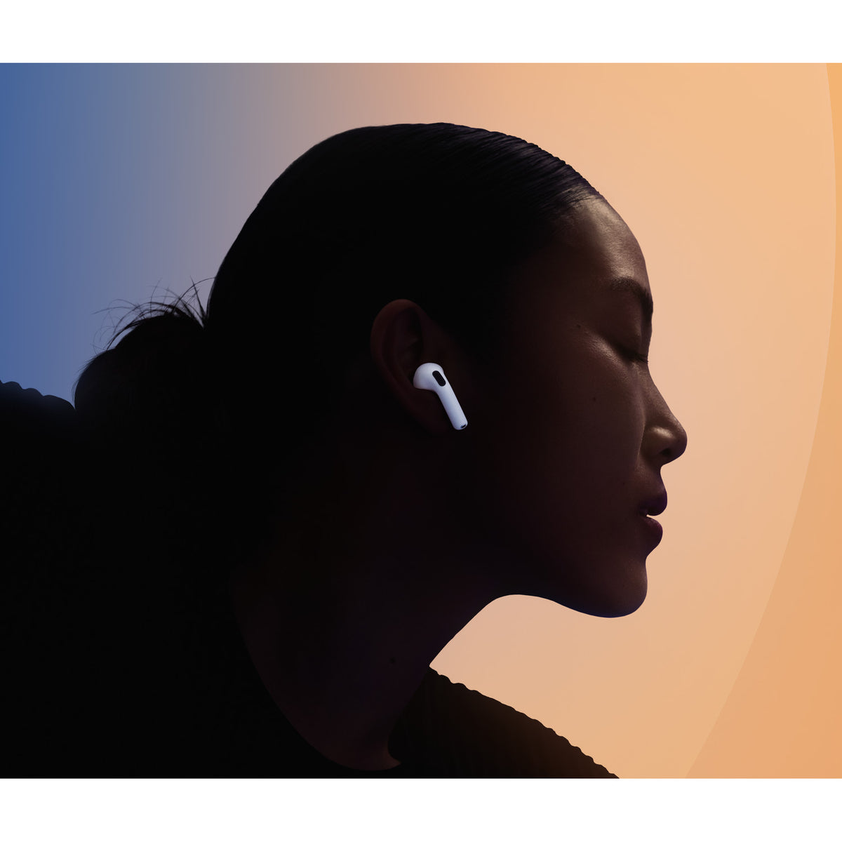A person wearing AirPods 5